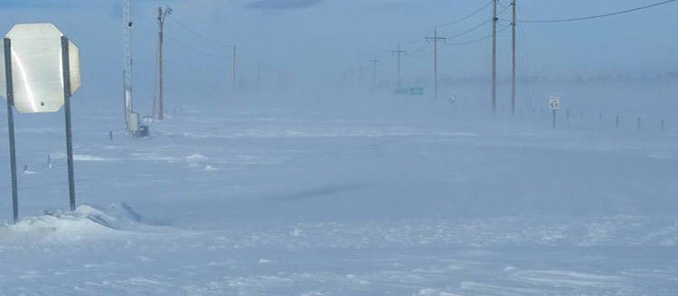 A highway on the Cheyenne River Indian Reservation is impassable after a blizzard.