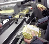 The factory produces the popcorn balls from start to finish, complete with sealing them in plastic packages and labeling.