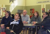 Students and houseparents listened intently to Melinda and Destiny.