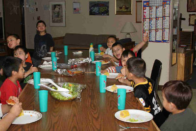 Lakota students eating their meals together.