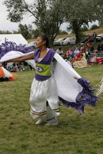 Jena dancing the Fancy dance at St. Joseph's annual powwow.