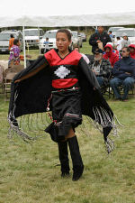 Tonya dancing the Fancy dance at St. Joseph's annual powwow.