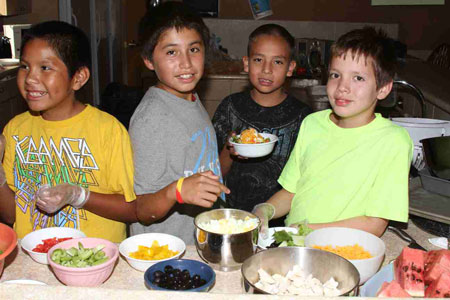Lakota boys at St. Joseph's Indian School prepare for dinner