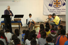 St. Joseph’s drum group, the Chalk Hills Singers, helped James keep the beat during one of his songs.  