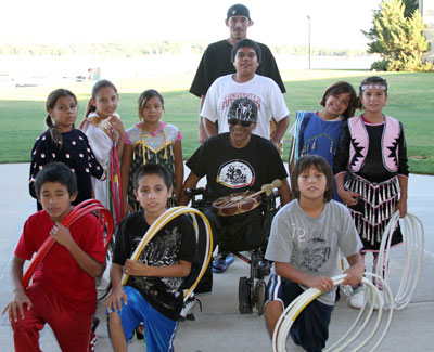 Lakota students pose for a picture before performing hoop da
