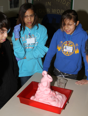 Native American students learn about chemical reactions.